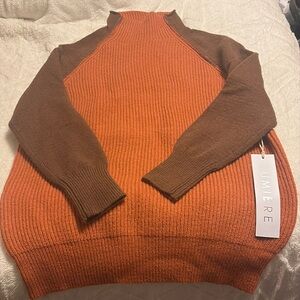 BNWT Lumiere sweater. Size small